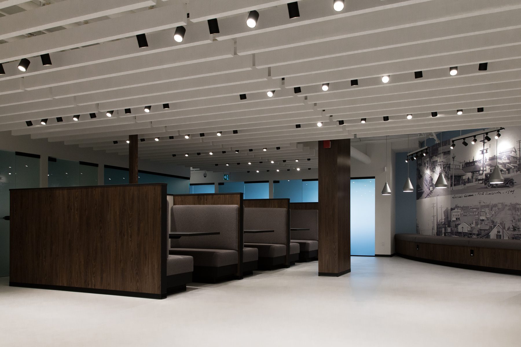 West Quay commercial tenant improvement — proprietary blade baffle ceiling with integrated lighting, North Vancouver